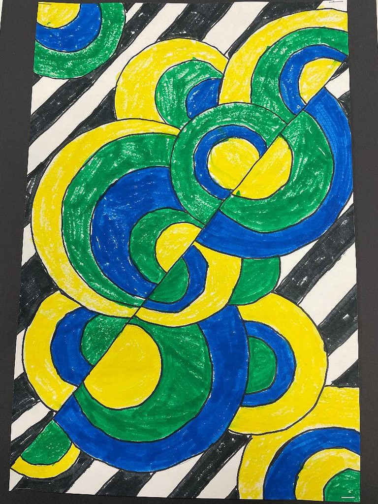 geometric art drawing made with black, blue, green and yellow markers