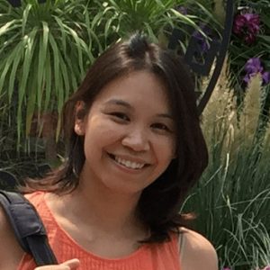 Montessa Lizaso profile picture. Woman with mid length brown hair in orange tank top